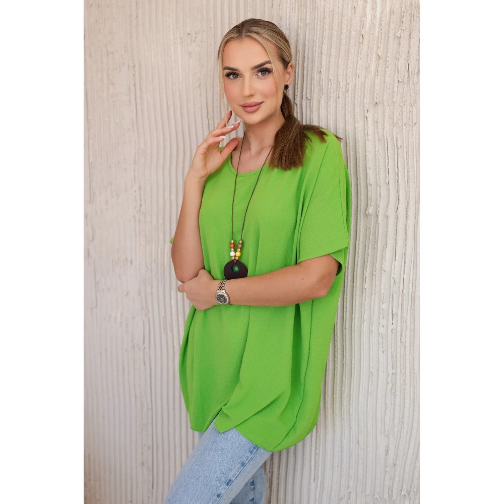 Kivi spalvos oversize palaidinė su pakabuku nuotrauka Kivi spalvos oversize palaidinė su pakabuku nuotrauka